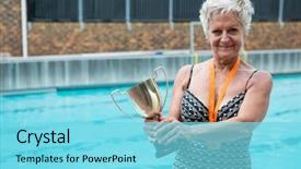  Presentation with trophy - Beautiful PPT theme featuring swimming awards - portrait of happy senior woman backdrop and a arctic colored foreground