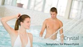  Presentation with stream - Theme featuring swimming pool - young couple have fun under water stream focus on woman in bikini background and a soft green colored foreground