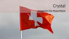  Presentation with switzerland - PPT theme consisting of swiss flag waving against blue background and a coral colored foreground