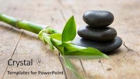  Presentation with green beauty - Slides with table black massage stones necessary background and a soft green colored foreground