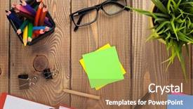  Presentation with flower office desk table - PPT theme consisting of table with notepad colorful pencils background and a tawny brown colored foreground