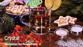  Presentation with tea pouring into glass transparent - PPT theme enhanced with table xmas treats and candel background and a tawny brown colored foreground