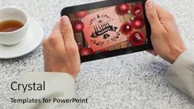  Presentation with christmas card - PPT theme consisting of tablet at table against christmas background and a  colored foreground