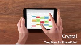  Presentation with hands holding black tablet - PPT theme with tablet with timetable and calendar background and a tawny brown colored foreground