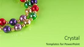  Presentation with plastic - Colorful slides enhanced with tacky christmas - colorful plastic beads on green backdrop and a mint green colored foreground
