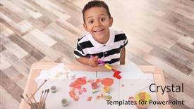  Presentation with talent development - Slide deck featuring talent development - little african-american boy painting background and a lemonade colored foreground