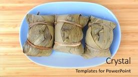  Presentation with pudding - Slide deck consisting of tamale - chinese rice dumplings zongzi wrapped background and a  colored foreground