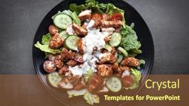  Presentation with view of the salt mine - Presentation consisting of tandoori chicken salad overhead view on black slate background and a tawny brown colored foreground