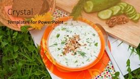  Presentation with milk - Slide set consisting of tarator cold sour milk soup in an orange bowl background and a gold colored foreground