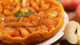  Presentation with apple - PPT layouts having tarte tatin french apple pie on wood background background and a gold colored foreground