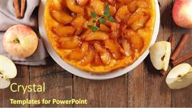  Presentation with apple - PPT theme featuring tarte tatin french apple pie on wood background background and a tawny brown colored foreground