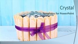  Presentation with blueberries - Colorful theme enhanced with tasty cake charlotte with blueberries on blue wooden table backdrop and a cool aqua colored foreground
