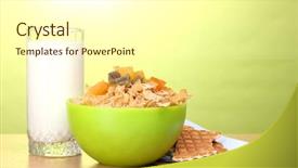  Presentation with green glass - Slides consisting of tasty cornflakes in green bowl and glass of milk on wooden table on green background background and a cream colored foreground