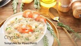  Presentation with shrimps - Theme consisting of tasty cream soup with fresh shrimps and croutons in bowl on table background and a lemonade colored foreground