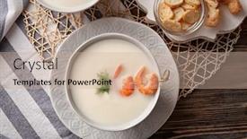  Presentation with shrimps - PPT layouts with tasty cream soup with shrimps in bowl on table background and a coral colored foreground