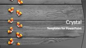  Presentation with halloween candy assorti - Presentation theme enhanced with tasty halloween candies on wooden background and a  colored foreground