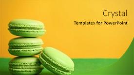  Presentation with green color - Colorful presentation theme enhanced with tasty macarons on green surface against color background backdrop and a yellow colored foreground