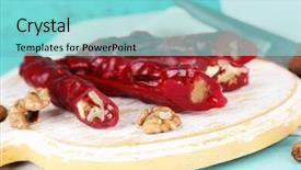  Presentation with sweets - Beautiful theme featuring tasty-oriental-sweets-churchkhela backdrop and a seafoam green colored foreground