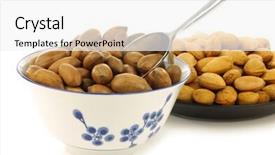  Presentation with black ceramic - Colorful slide set enhanced with tasty pecan nuts in a ceramic bowl and almonds on a black plate with a metal scoop on a white background backdrop and a white colored foreground