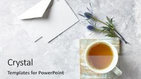  Presentation with tea cup - Beautiful presentation featuring tea and sea holly flower backdrop and a white colored foreground