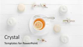  Presentation with porcelain - Beautiful presentation theme featuring tea with lemon in white porcelain dishware macaroons and zefir on side topivew backdrop and a light gray colored foreground