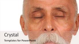  Presentation with elderly icon - Amazing PPT theme having tear running down the face backdrop and a  colored foreground