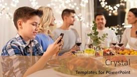  Presentation with dinner party - Audience pleasing presentation design consisting of technology holidays and people concept - happy boy with smartphone having family dinner party at home backdrop and a coral colored foreground