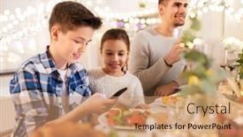  Presentation with dinner party - Presentation consisting of technology holidays and people concept - happy children with smartphone at family dinner party background and a coral colored foreground