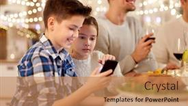 Presentation with dinner party - Audience pleasing theme consisting of technology holidays and people concept - happy boy with sister using smartphone having family dinner party at home backdrop and a coral colored foreground
