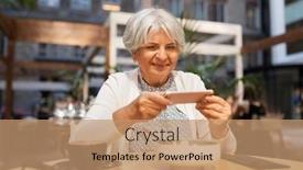  Presentation with old age - Audience pleasing theme consisting of technology old age and people concept - happy senior woman photographing dessert by smartphone at street cafe backdrop and a coral colored foreground