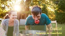  Presentation with apple - Slide deck with teenage boy apple in mouth apple bobbing at garden party background and a tawny brown colored foreground