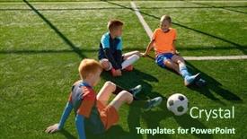  Presentation with football field - PPT theme enhanced with teenage-boys-football-team-talking background and a tawny brown colored foreground