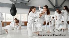  Presentation with aikido - Presentation featuring teenage-girls-fighting-at-aikido background and a light gray colored foreground