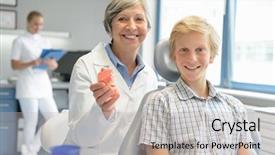  Presentation with dentures - Colorful slides enhanced with teenager boy patient dentist hold teeth dentures dental assistant office backdrop and a light gray colored foreground