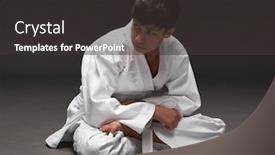  Presentation with martial arts - PPT layouts having teenager-dressed-in-martial-arts background and a dark gray colored foreground