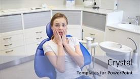  Presentation with dental office - PPT theme enhanced with terrified patient girl at dental background and a light blue colored foreground