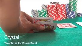  Presentation with reveal - PPT layouts consisting of texas hold 'um poker player peels back her cards to reveal a suited king and jack of hearts that could potentially lead to a hearts royal flush generic no label card backs from china background and a ocean colored foreground