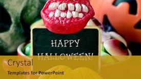  Presentation with scary halloween - Presentation theme enhanced with text happy halloween written in a chalkboard different halloween candies and cookies and some scary ornaments such as a skull or a carved pumpkin background and a gold colored foreground