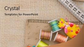  Presentation with needles - Presentation consisting of textile fibers spinning - sewing material colorful bobbins needles background and a soft green colored foreground