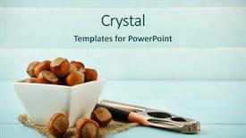  Presentation with hazelnuts - Presentation with the bowl and nutcracker background and a sky blue colored foreground