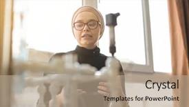  Presentation with technology education - Slides consisting of portrait of a young female muslim student standing in the electronic classroom education and technology concept background and a coral colored foreground