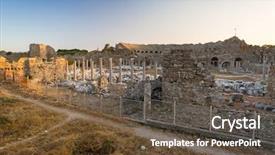  Presentation with ancient ruins - Audience pleasing PPT theme consisting of theater - ruins of the ancient theatre backdrop and a tawny brown colored foreground