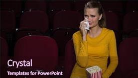  Presentation with woman crying - Cool new presentation theme with theater - woman crying while watching movie backdrop and a wine colored foreground