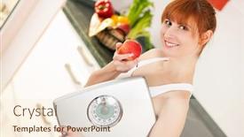  Presentation with healthy nutrition - Slide deck consisting of thin and beautiful woman standing in her kitchen with an apple and a weight scale in her hand symbol for loosing weight diet and healthy nutrition in the background there is a fruit bowl background and a lemonade colored foreground