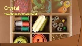 Presentation with sewing tools - Presentation theme featuring thread and sewing tools in box on brown background background and a red colored foreground
