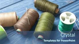  Presentation with tailoring - Theme enhanced with threads-for-tailoring-on-wooden background and a ocean colored foreground