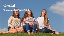  Presentation with look - PPT theme with three barefoot girls sit at green grass and look into distance at sunny day background and a teal colored foreground