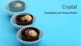  Presentation with paper cups - Presentation theme featuring three chocolate candies with nuts in paper cups on blue background background and a arctic colored foreground