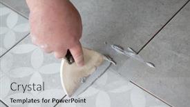  Presentation with home renovation - PPT theme consisting of tiler-laying-the-ceramic-tile background and a light gray colored foreground