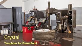  Presentation with tire - Slide set consisting of tire-changer-and-other-equipment background and a tawny brown colored foreground